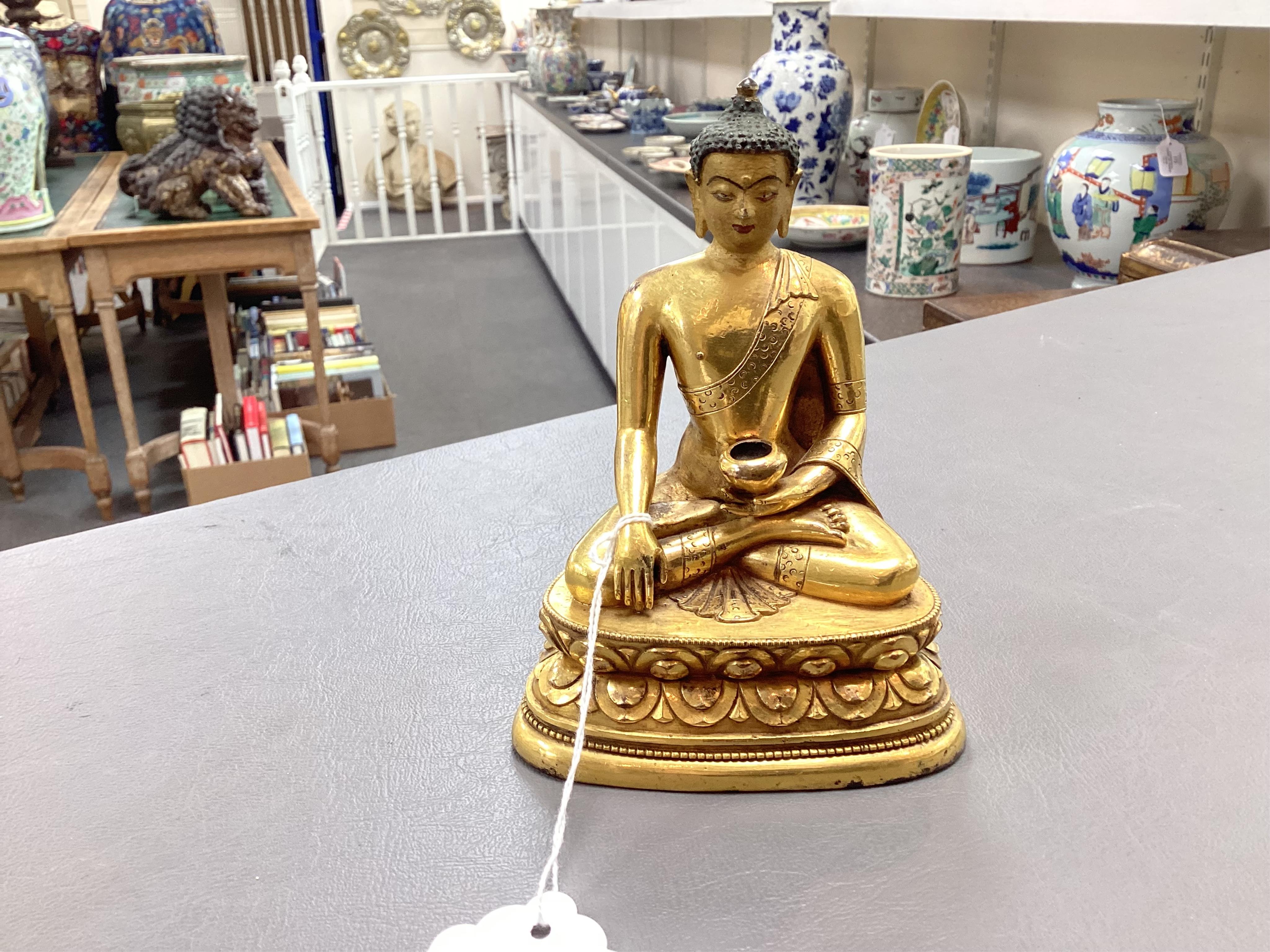 A Mongolian gilt-bronze figure of Buddha Shakyamuni, possibly 18th century